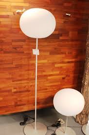 One 25 watt 120 volt t4 g9 base halogen bulb is required, but not included. Replica Flos Glo Ball Floor Lamp