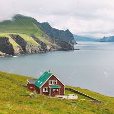 Find the perfect denmark landscape stock photo. Lighthouse Keepers House On The Mykines Island Faroe Islands Stock Photo Picture And Royalty Free Image Image 147671918