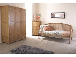 This bedroom set blends contemporary and traditional styles that make it feel familiar, yet bold. Madrid Oak Rubberwood 3ft Single Wooden Day Bed Frame Only