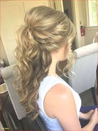 The crown braid half up and half down hairstyle is a festive look that will look gorgeous on curly hair. Wedding Hairstyles Wedding Hairstyles For Long Curly Hair Half Up