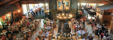 The old faithful inn has charmed a multitude of lives and is unforgettable to nearly all who walked through its massive red doors. Old Faithful Inn Dining Room Yellowstone Dining