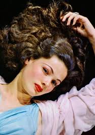 It really is difficult to actually name the absolute most beautiful woman  from Hollywood's Golden Years. It is also very subjective because many have  different tastes and preferences. Here is my pick