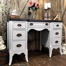 I made it using ½ of a broken coffee table top, 2 random legs and a few 1x's. Gray Painted Desk With Espresso Stain Top By Just The Woods