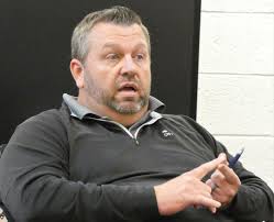 Woman asks Bucyrus school board to reject basketball coaches' contract