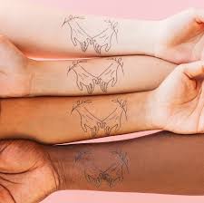 Here is an idea for the placement for your pinky promise tattoos. Pinky Promise By Tea Leigh From Tattly Temporary Tattoos