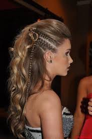 Side braids are joined by one back braid into a bun, with side hair then twisted and wrapped around.this is a very romantic braided updo and works for a wedding or romantic date night. Maybe Just Slicked Back Instead Of The Braids Hair Styles Curly Hair Styles Hairstyle