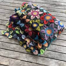 Free crochet patterns for afghans, throws and squares at craftown lots of unique items to chooses from here choose your favorite throws, afghans. Hedvig Floral Crochet Throw Arne Carlos Shop