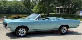 Image result for Canard Blue 1966 Mazda