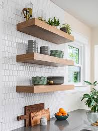 White oak, clean sleek lines, and modern farmhouse are two design components that are trending hot right now, but not in the sense that they are fads, the design is popular how to turn ikea kitchen cabinets into a builtin bench with drawers here. Chunky Oak Floating Shelves On White Picket Backsplash Tiles Transitional Kitchen