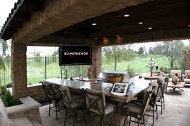 A subcompact drop down lift you can use to hide a tv inside a hanging kitchen cabinet. Loggia Ceiling Drop Down Tv Mediterranean Landscape Orange County By Experience Audio Video Inc Houzz