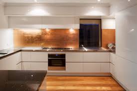A metallic backsplash, be it brass or copper, is a great way to bring the metallic trend into your kitchen, and to add a touch of luxury to a modern space. 39 Trendy And Chic Copper Kitchen Backsplashes Digsdigs