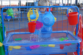 Sand And Water Activity Frame Being Used In Early Years Exploring With The Children S Senses Edxeducation Fostering Children Sand And Water Childrens Learning