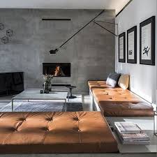 Brutalist Interiors Live The Combination Of Honey Leather With Rustic Medium Gray Living Decor Modern Interior Design Interior Design
