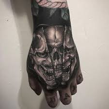 125 Best Skull Tattoos For Men Cool Designs Ideas 2021 Guide Hand Tattoos For Guys Skull Hand Tattoo Tattoos For Guys