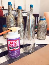 Tutorial For Diy Glittered Wine Bottles Glitter Wine Bottles Wine Bottle Diy Diy Bottle Crafts
