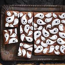 Whip up these cheesy pastry puffs with just four ingredients, then make each pair come alive with slices of cucumber and olive, and squiggles of tasty sriracha. 51 Best Halloween Treats Easy Halloween Dessert Recipes