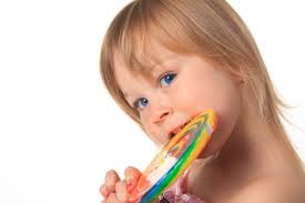 Lovely Child Big Candy Stock Photo