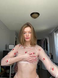 Nudes of a young girl with a hairy pussy.