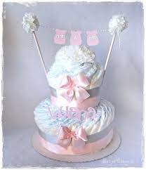 The term shower is often assumed to mean that the expectant mother is showered with gifts. Baby Shower Diaper Cake It S A Girl Babyscakes