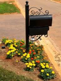 Decorate Around Mailbox Using Vines Flowers And Shrubs Mailbox Landscaping Mailbox Garden Landscape Solutions