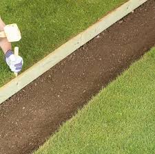 Use rocks for a more natural look or pavers to keep things neat. Path Edging Pegs Hartwells Fencing