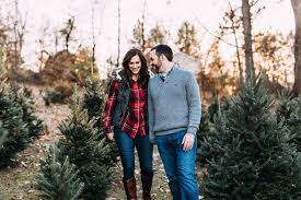 A christmas tree farm engagement is the perfect idea for couples who love winter and the outdoors! Hamill Christmas Tree Farm Engagement Virginia Wedding Photographer