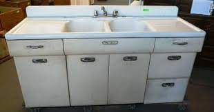 The total cost need to be calculated according to your kitchen layout. Vintage Kitchen Sink Cabinet Cant Wait To Get Rid Of This Vintage Kitchen Sink Metal Kitchen Cabinets Metal Kitchen