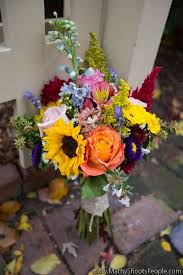 Roses Sunflowers Delphinium Celosia And Solidago Photo Courtesy Of Mathy Shoots People Rustic Wedding Flowers Zinnia Wedding Bouquet Wildflower Bouquet