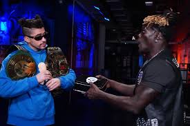 The wwe's decision to let bad bunny into the ring at wrestlemania 37 was a good one for bad the puerto rican musical star and wwe superfan didn't just do well in his first pro wrestling match. Bad Bunny Hands Wwe 24 7 Title To R Truth On Raw