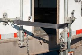 Retractable dock door safety strap. Freight Saver Trailer Door Safety Strap For Trailer Doors