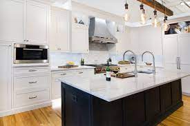 Need some white kitchen ideas? Classic White Kitchen Stainless Steel Hood Classic Kitchen Design Contemporary Kitchen Classic White Kitchen