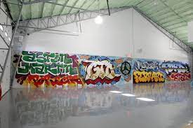 This parking garage has given itself over to graffiti artists and the neighborhood can't thank them enough. Luxury Graffiti Garage Mural High End Residential Man Cave