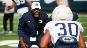 Coach Stan Drayton giving advice to players