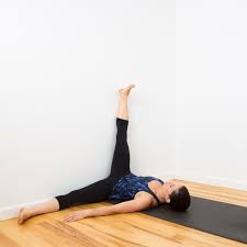 You Ll Feel So Much Better After This Restorative Wall Yoga Sequence Wall Yoga Legs Up The Wall Yoga Sequences