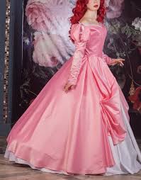 With puff sleeves, sparkles and shimmering fabric. Ariel Pink Dress Inspired By The Little Mermaid Cosplay Etsy Ariel Pink Dress Princess Ball Gowns Pink Dress