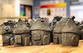 Roll a lump of clay using a rolling pin, until the whole slab is an even height. Clay Slab Houses Sketchbook Studio
