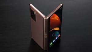 The facade of the samsung store is shown and then the camera goes inside the store, showing a row of galaxy z flip phones on display. Samsung Galaxy Z Fold 3 And Galaxy Z Flip 3 Key Details Slashgear