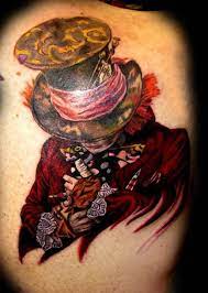 You can also achieve a minimal look by just getting the hat of the mad hatter tattooed and add some interesting colors to it. Hatter Inkfreakz Com Mad Hatter Tattoo Wonderland Tattoo Sleeve Tattoos