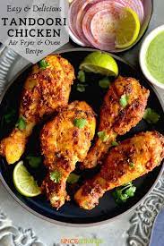 Actually this is a chicken dish prepared by roasting chicken marinated in yogurt and spices in a clay tandoor. Tandoori Chicken Recipe Air Fryer Oven Instant Pot Spice Cravings