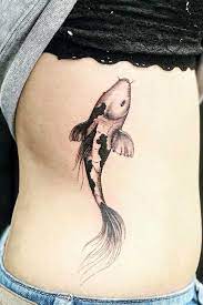 A Complete Guide To Koi Fish Tattoo Koi Fish Tattoo Small Fish Tattoos Black And White Koi Fish Tattoo