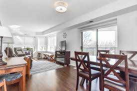 new listing looking for a bright airy 2 bedroom condo with a great central location 303 281 b living dining room home white subway tile backsplash
