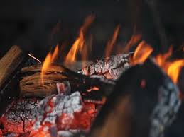 You can actually make fire from a piece of ice. Fire Wood In The Grill Stock Video Pond5