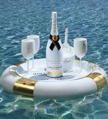 Lady Diva In The Pool With Her Champagne On Ice At The Ready For Her Guests Luxurydotcom Champagner Exklusive Geschenke Geschenke Kaufen
