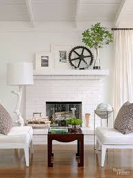 Is not painted the expected white and the stripe white and black drapes frames and anchors the fireplace.the white walls in the rest of room is just right. Painted Brick Stone Fireplace Inspiration The Inspired Room