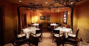 A typical creole double parlor with stunning silver leaf ceilings, fireplaces and french doors, provides the perfect setting for cocktails in one parlor and brunch, lunch or dinner in the other. Private Dining Gw Fins