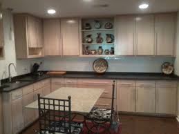 Pickled kitchen cabinets give a kitchen a bright appearance while still allowing the tree's veins to show through, keeping these cabinets clean can be a challenge. Kitchen Simple Pickled Oak Cabinets For Traditional Incredible Furniture