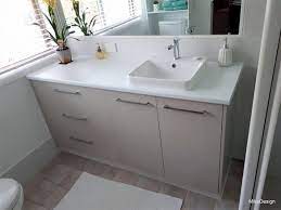 They come in a wide range of styles and colors and represent one of the most economical choices for bathroom countertops. Bathroom Vanity With Timber Grain Melamine Doors And Laminated Benchtop Mike Design