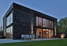 Our new monthly baking recipe club is live! Black Brick Villa With Chic Scandinavian Charm Brick Architecture Modern Brick House Scandinavian Exterior Design