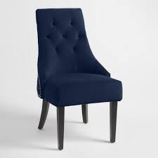 The Curvy Silhouettes Of Our Ink Blue Dining Chairs Bring To Mind The Everyday Glamo Dining Room Chairs Upholstered Blue Dining Chair Upholstered Dining Chairs