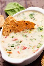 Melty White Cheese Spinach Jalapenos And Diced Tomatoes Come Together In This Incredible Dip Th Best Mexican Recipes Mexican Food Recipes Best Dip Recipes